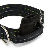 Black dog collar with reflective stripes and metal clasp on a white background