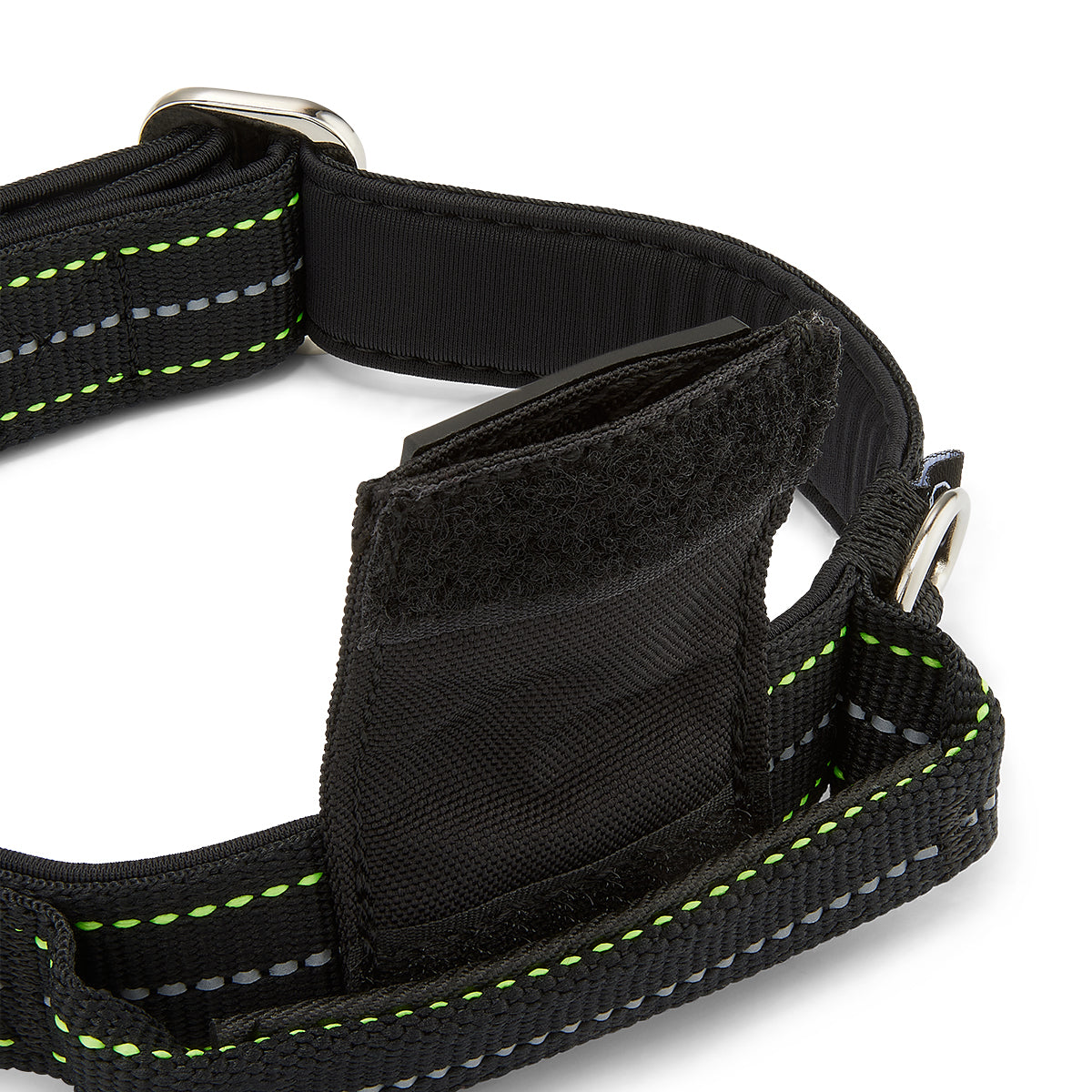 Black dog harness with reflective stripes on a white background